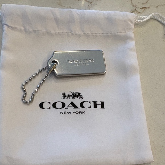 Coach Accessories - Coach Silver Metal Hangtag EUC